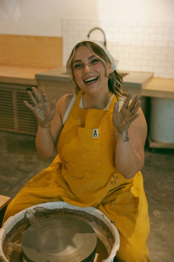 Katy in yellow overalls